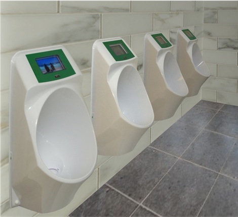 Impression some waterless/waterfree urinals with media player on a row